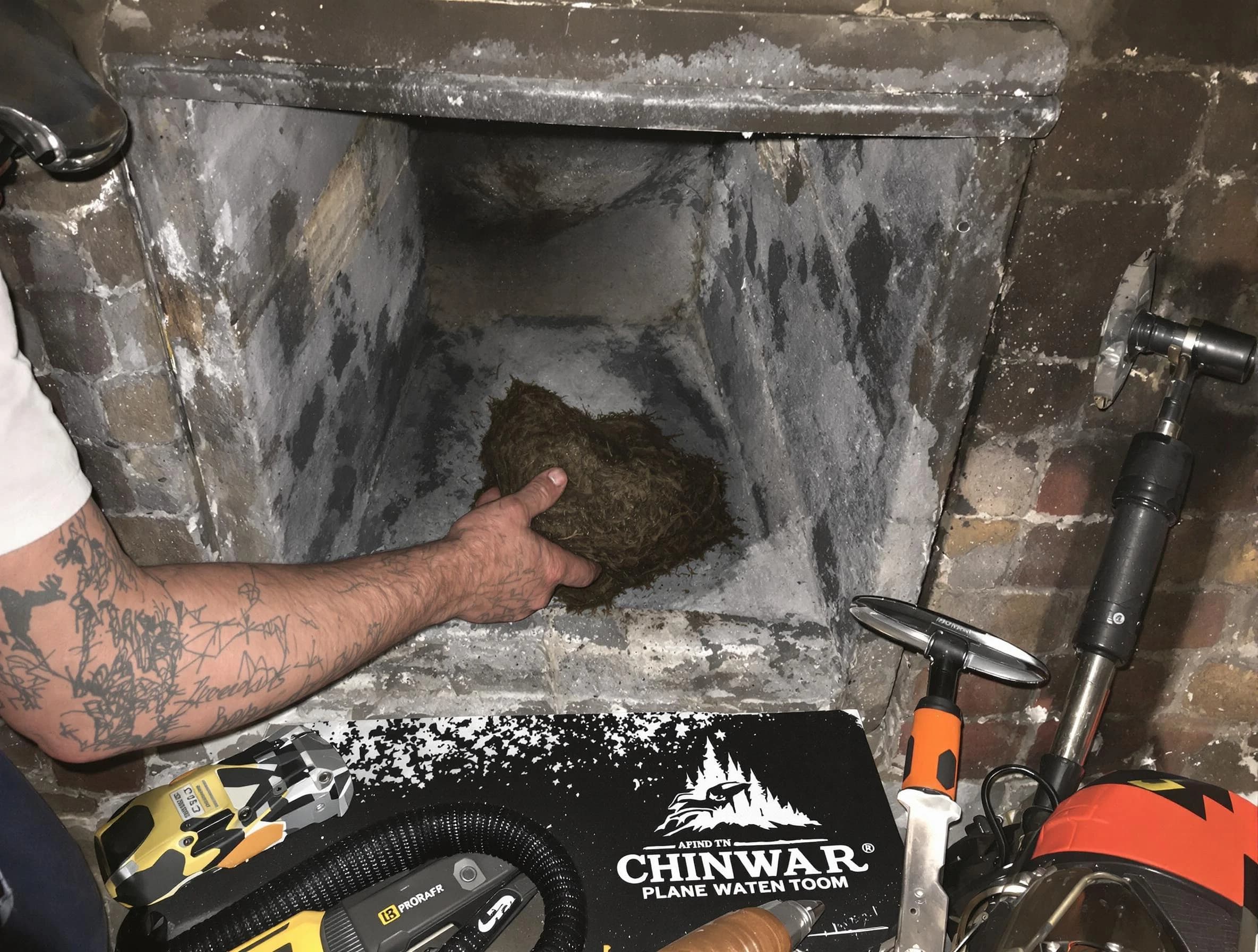 Morrow Chimney Sweep safely removing debris and screening chimney in Morrow, GA